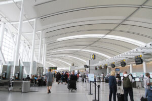 Toronto, Canada: Travellers walk through Terminal 1 of Toronto Pearson International Airport.